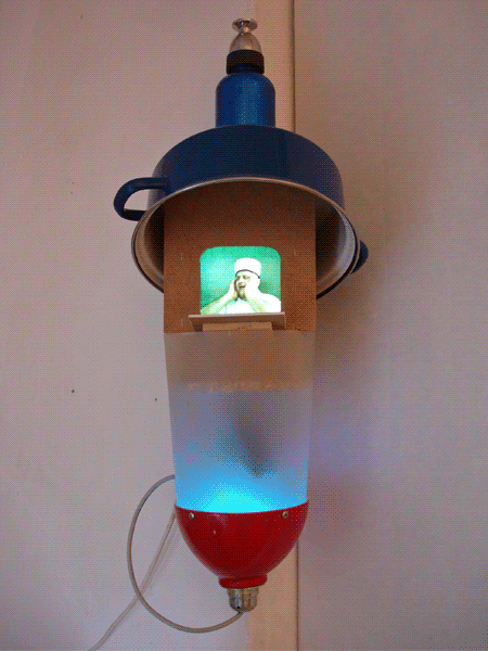 PULPIT (muezzin), 2011, 90x40x40cm, metal pot, plastic bucket, colour changing lamp, wood, monitor