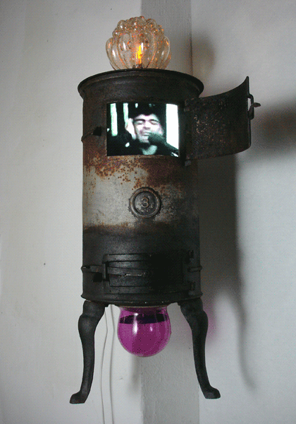 PULPIT (muezzin), 2011, 110x50x60cm, cast-iron stove, lamp, glass bubble, monitor