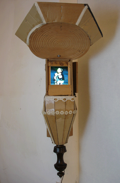 PULPIT (R.Regan, MLKspeechComp, SudanesianGirl, S.Suzuki), 2011, 50x60x100cm, wood, cardboard, monitor 