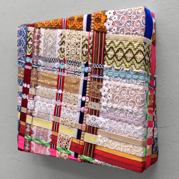NETWÖRK 4, 2014, 41x46x12cm, fabric belts, strings, wool, wire, cable on wooden plate